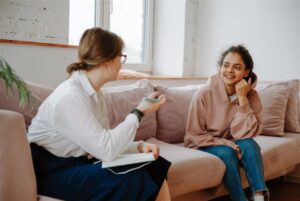 FemaleTherapistAndAdolescentGirl